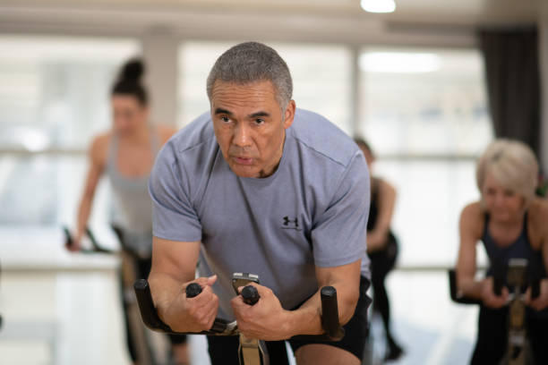 istock Afternoon stationary cycling class 1141567319