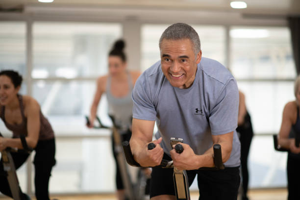 istock Afternoon stationary cycling class 1141567325