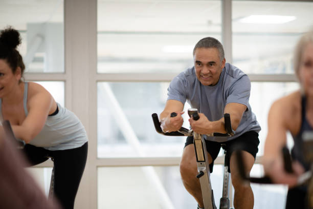 istock Afternoon stationary cycling class 1141567340