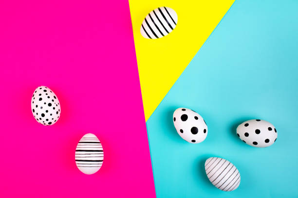 istock Different graphic hand drawn eggs on bright background in trendy colors. 1141567429