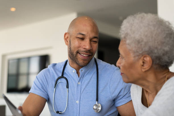 istock Doctor showing his patient their results 1141567661