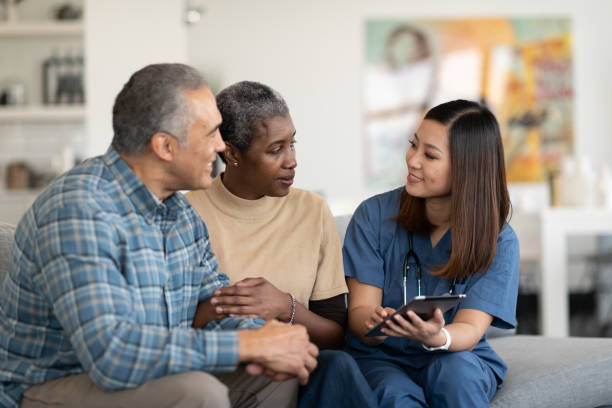 istock Sharing results with an elderly couple 1141567664