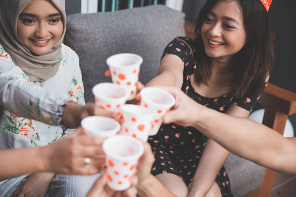istock friends enjoying party and cheers 1141570406