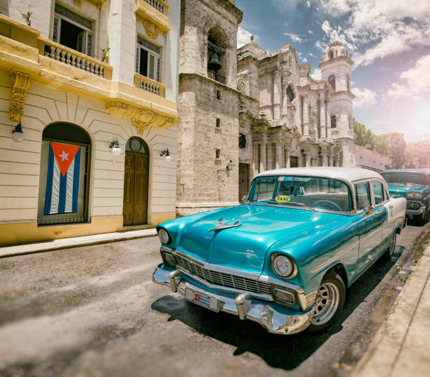 istock Vintage oldtimer car driving through Old Havana Cuba 1141571238