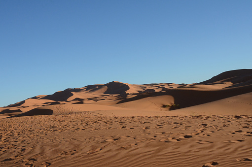 A view of the Sahara Desert in Morocco in late afternoon as sunset nears
