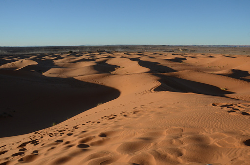 A view of the Sahara Desert in Morocco in late afternoon as sunset nears