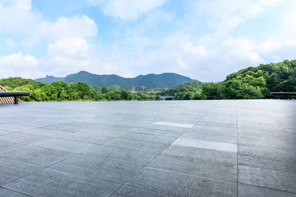 istock Empty floor and green mountain with sky landscape 1141572432