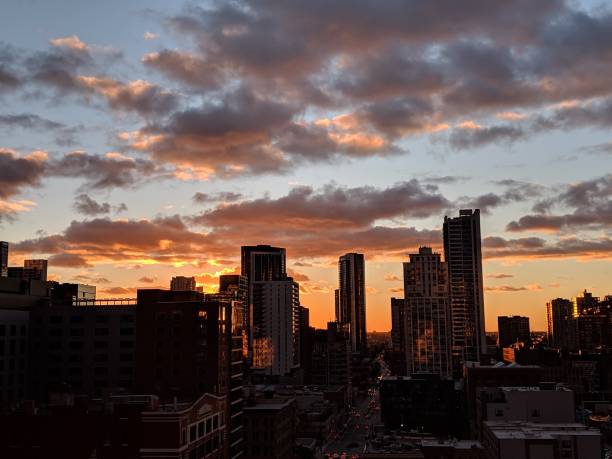 istock Beautiful sunset with city skyline 1141572450