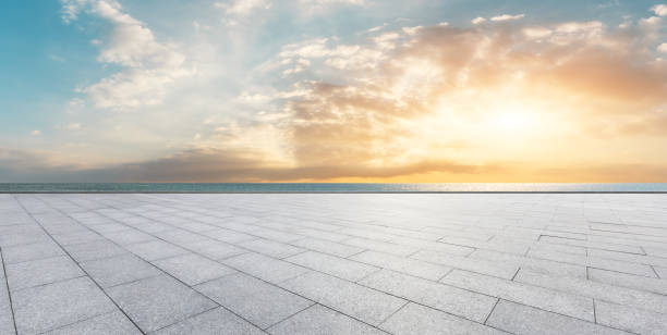 istock Empty floor and blue sea with sky clouds at sunset 1141573271