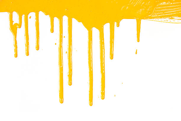 Orange paint  dripping / isolated on white / real photo stock photo