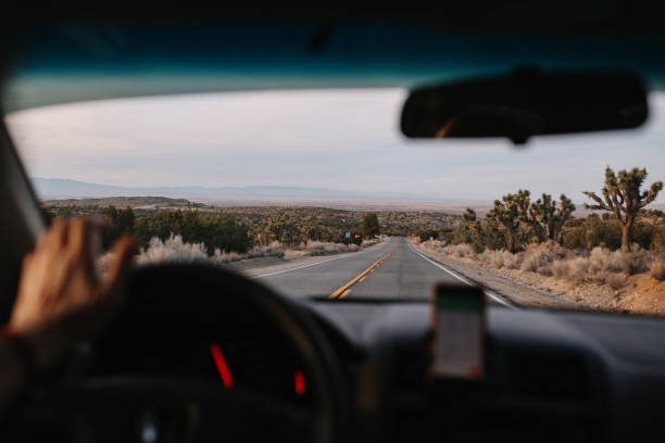 istock driving through the California desert 1141580368