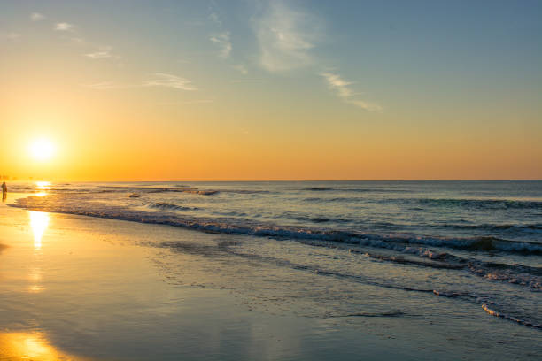 istock Morning sunrise on the beach 1141580381