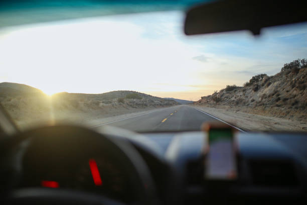 istock driving through the California desert 1141580384