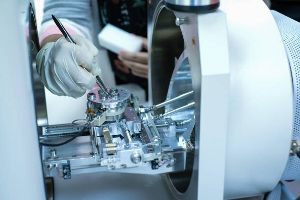 Scientist is preparation of nanomaterials for Scanning Electron Microscope (SEM) machine in laboratory
