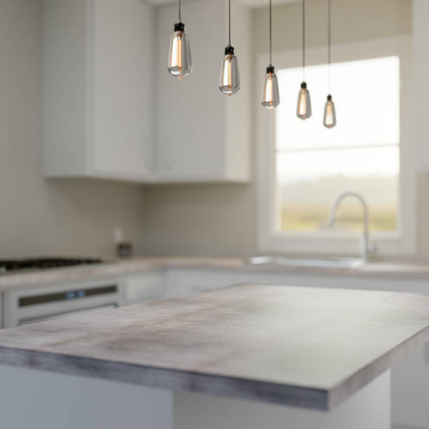 istock Bright Residential Kitchen Interior with focus on island in the foreground 1141581955