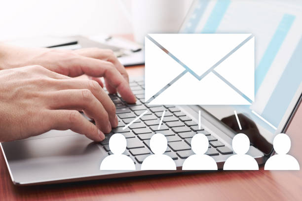 istock Businessman sending email for customers. 1141583729