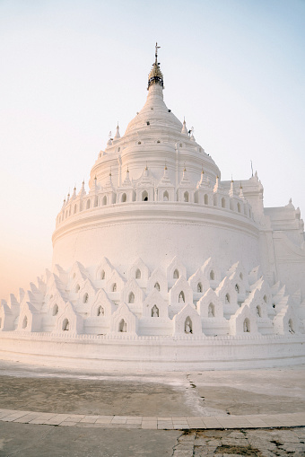 Scenic view of white Hsinbyume Pagoda in Mandalay  at sunset