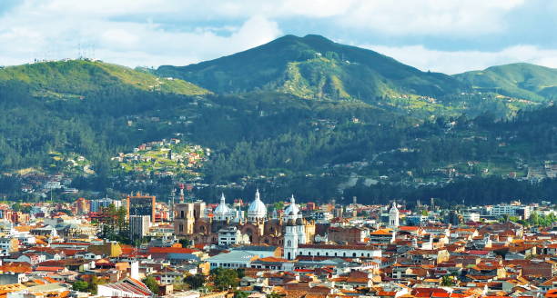 Panoramic view of the city Cuenca, Ecuador Aerial panoramic view of the city Cuenca, Ecuador, located in the valley of four rivers with its many churches and surrounding mountains cuenca ecuador stock pictures, royalty-free photos & images