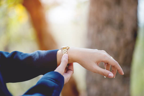 istock Hands and wrist watches worn Time view concept With copy space 1141588495