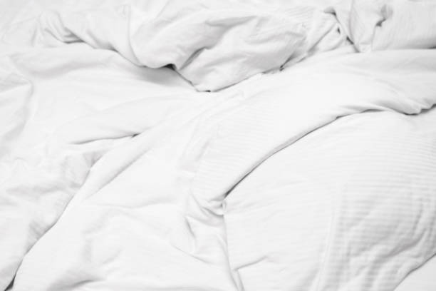 istock White delicate soft background of fabric or bedding sheet 1141588609