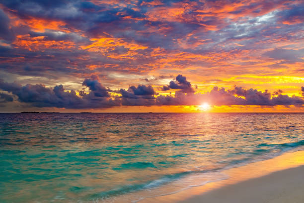 istock Vibrant sunset over ocean on Maldives 1141594092