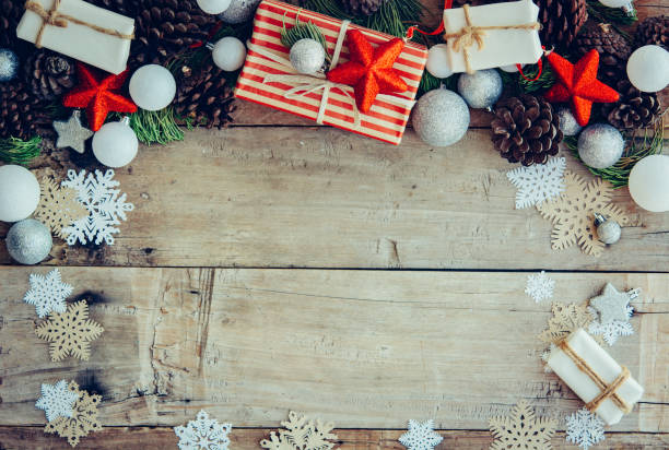 istock Christmas background with gift boxes and decorations on the wood 1141594607