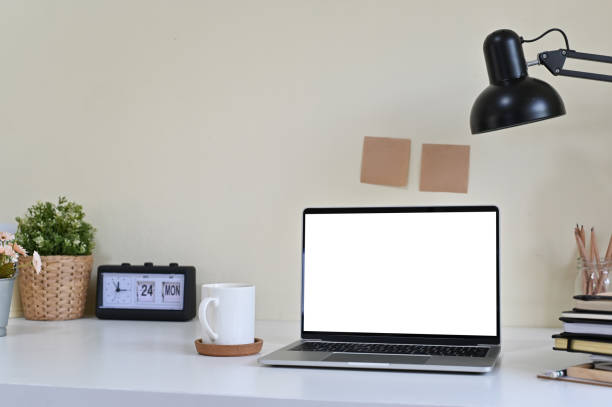 istock Mockup laptop computer and office supplies on workspace. 1141594647