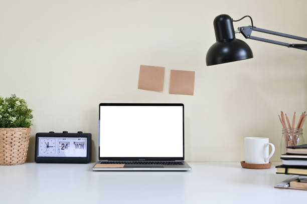 istock Mockup laptop computer and office supplies on workspace. 1141595334