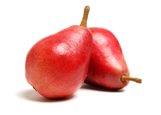 白い背景に分離赤い梨 - russet pears ストックフォトと画像