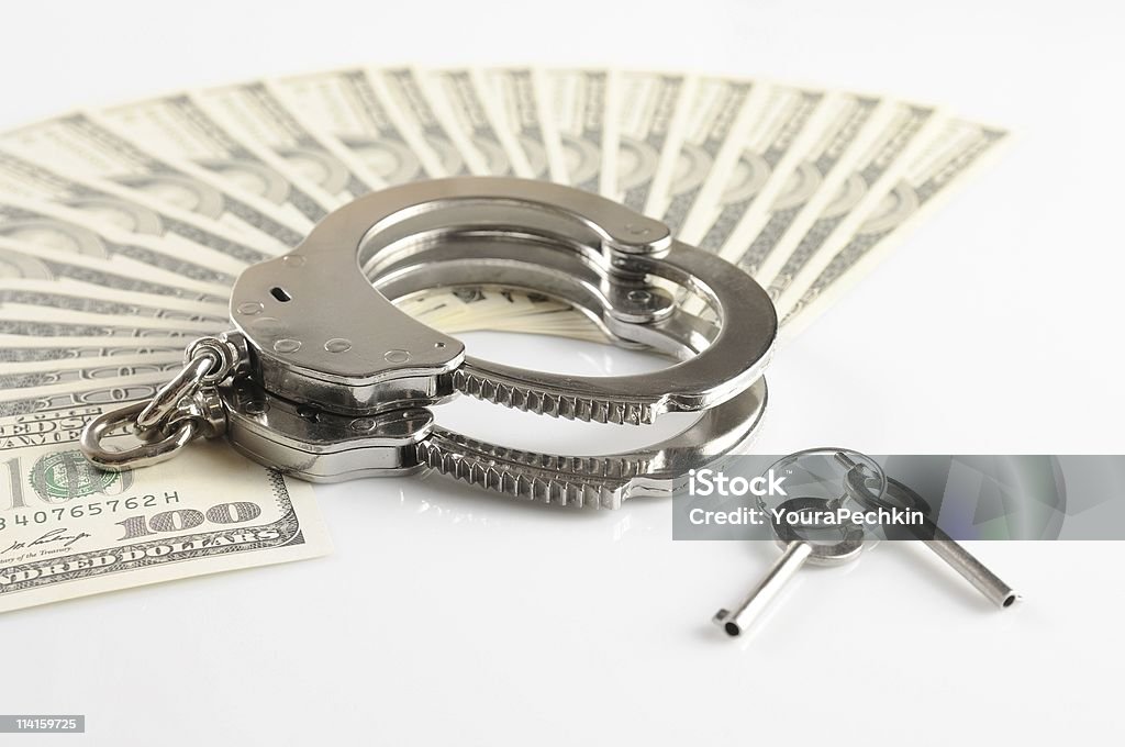 Money and Cuffs  Abundance Stock Photo