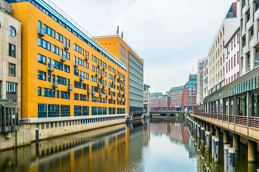 View of buildings alongside the kleine alster channel in Hamburg, Germany.
