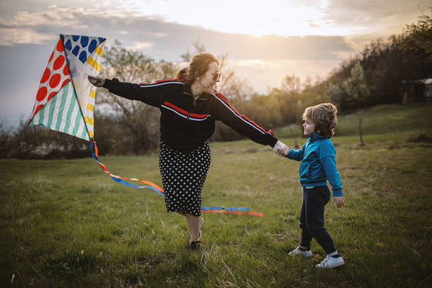 istock Mother and son playing in nature 1141598990