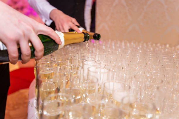 istock Pouring champgne in glass 1141599221