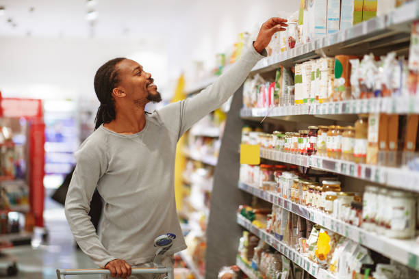 istock an reaching for groceries 1141603102