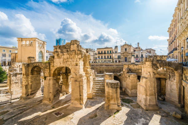 Ruins of Roman Amphitheatre Ancient Roman Amphitheatre in Lecce, Puglia region, southern Italy lecce stock pictures, royalty-free photos & images
