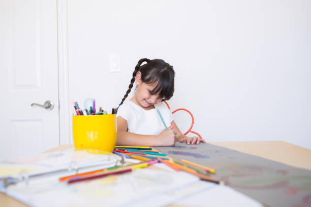 Happy child doing art