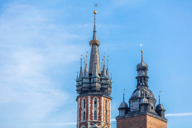Church of Our Lady Assumed into Heaven (also known as Saint Mary's Church) is a Brick Gothic church adjacent to the Main Market Square in Kraków, Poland. Built in the 14th century, its foundations date back to the early 13th century and serve as one of the best examples of Polish Gothic architecture.