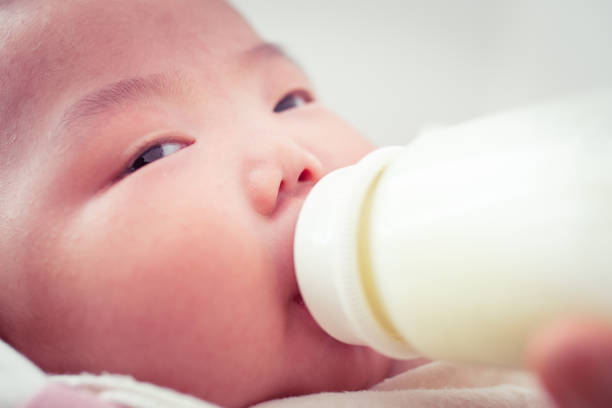 istock Feeding Newborn Baby 1141609110