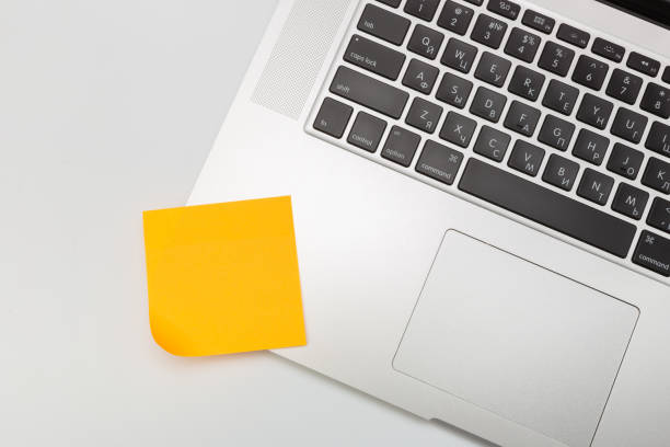 istock Sticky note on laptop with copy space. For all concept - Image 1141609751
