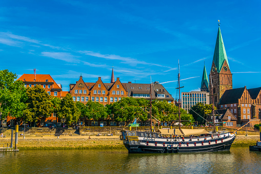 Weser riverside dominated by sankt martini church in Bremen, Germany.