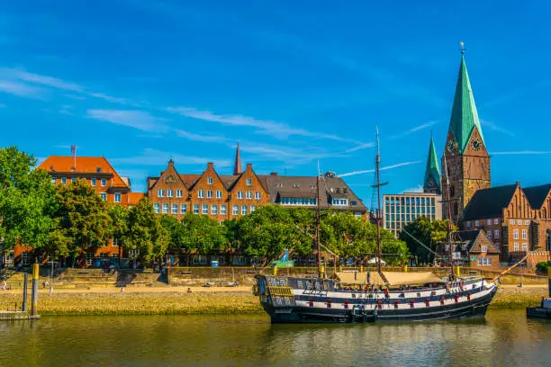 Weser riverside dominated by sankt martini church in Bremen, Germany.