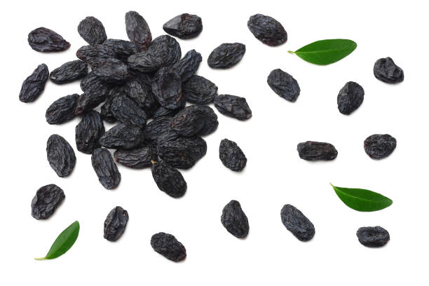 istock black raisins isolated on white background. top view 1141612529