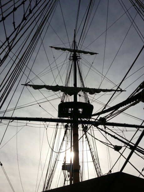istock Boat Ship mast through sunlight San Diego Pier 1141613777
