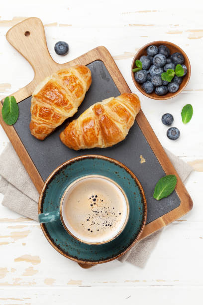 istock Coffee and croissants breakfast 1141614084