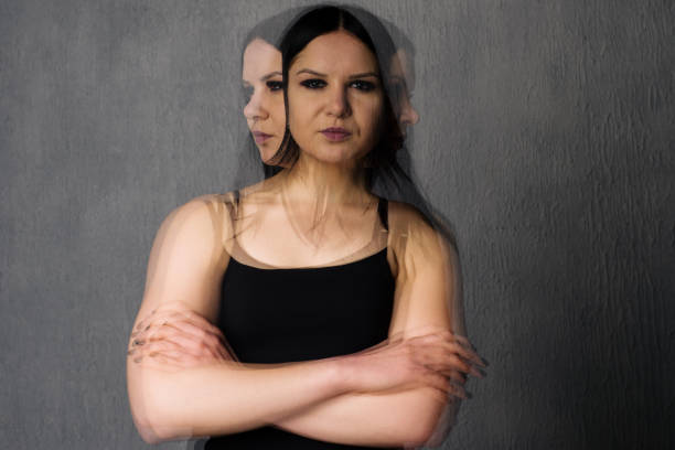 istock Woman with split personality suffers from schizophrenia 1141614766