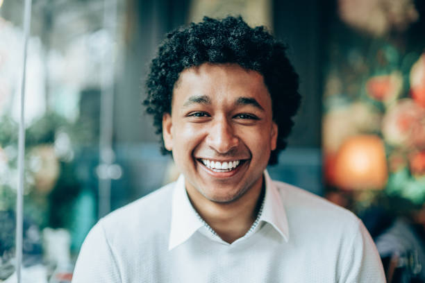 istock Happy afro-american man at cafe 1141615945