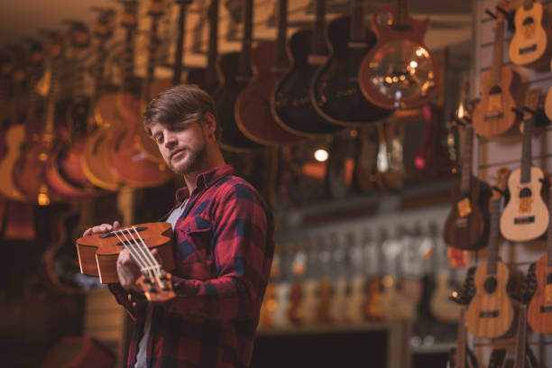 istock Young musician with a ukulele 1141622726