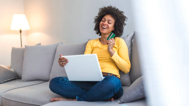 istock Mixed-race woman shopping on internet. 1141622904