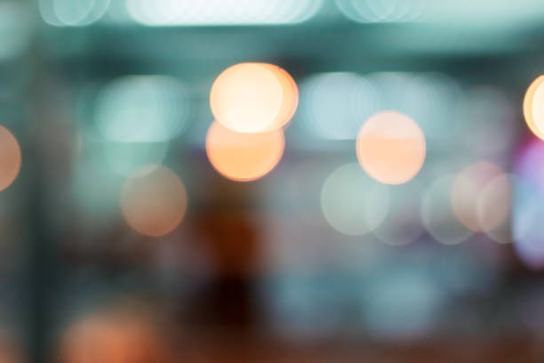 istock Defocused abstract colorful night lights background. Bokeh light 1141624830