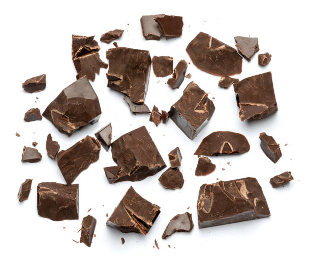 istock Dark or milk organic chocolate pieces isolated on white background 1141625044